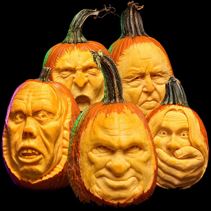 Carved pumpkin faces by Scott Cummins